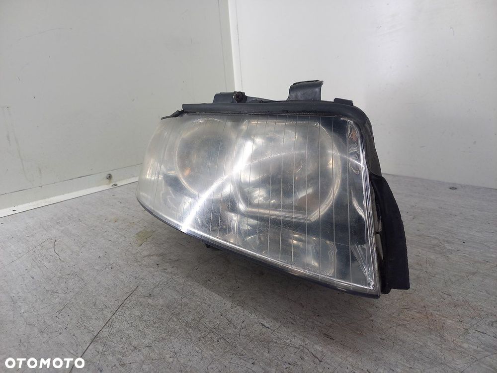 LAMPA PRZÓD PRAWA AUDI A4 B6 20-A007 TYC - 9