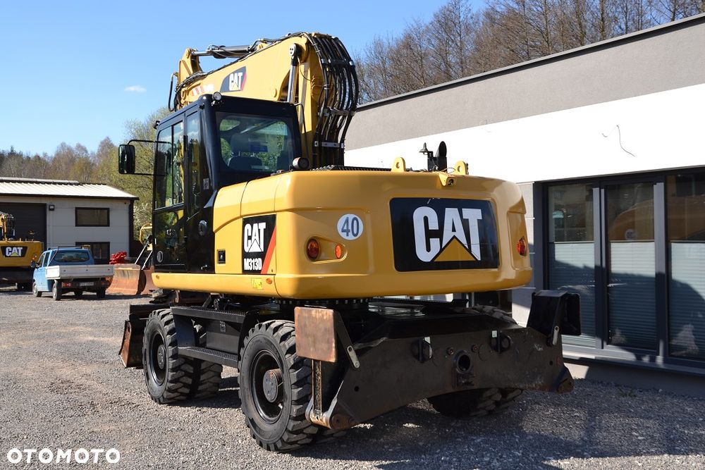 Caterpillar M 313 D, ROTOTILT - 7
