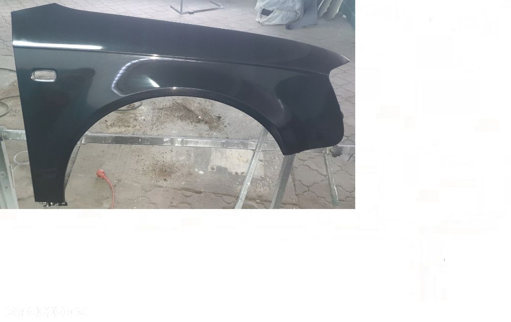 Audi A4 B7 04-08 błotnik  nowy kolor LZ9Y