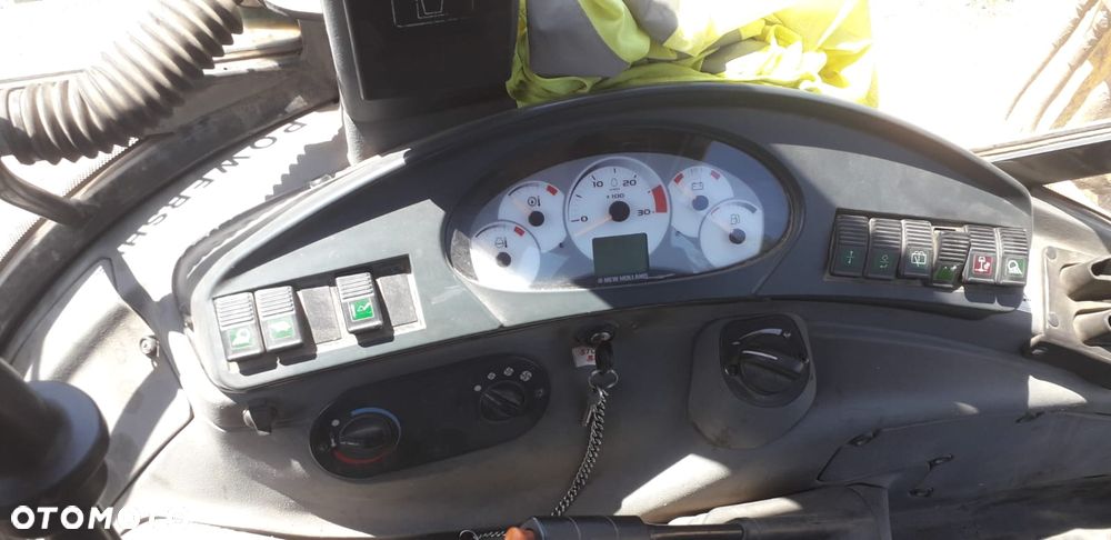 New Holland 110B - 15