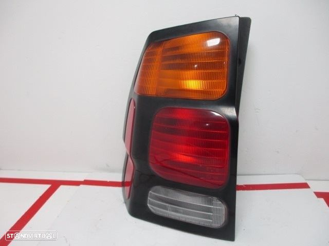 FAROLIM TRASEIRO ESQUERDO MITSUBISHI PAJERO SPORT I 2003 - - 4