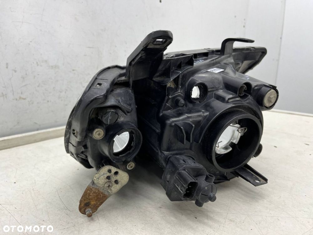 Lampa reflektor Mitsubishi L200 KA KB 05-10r. LEWA przednia H4 oryginalna lewy przód EU 8301b461 - 12