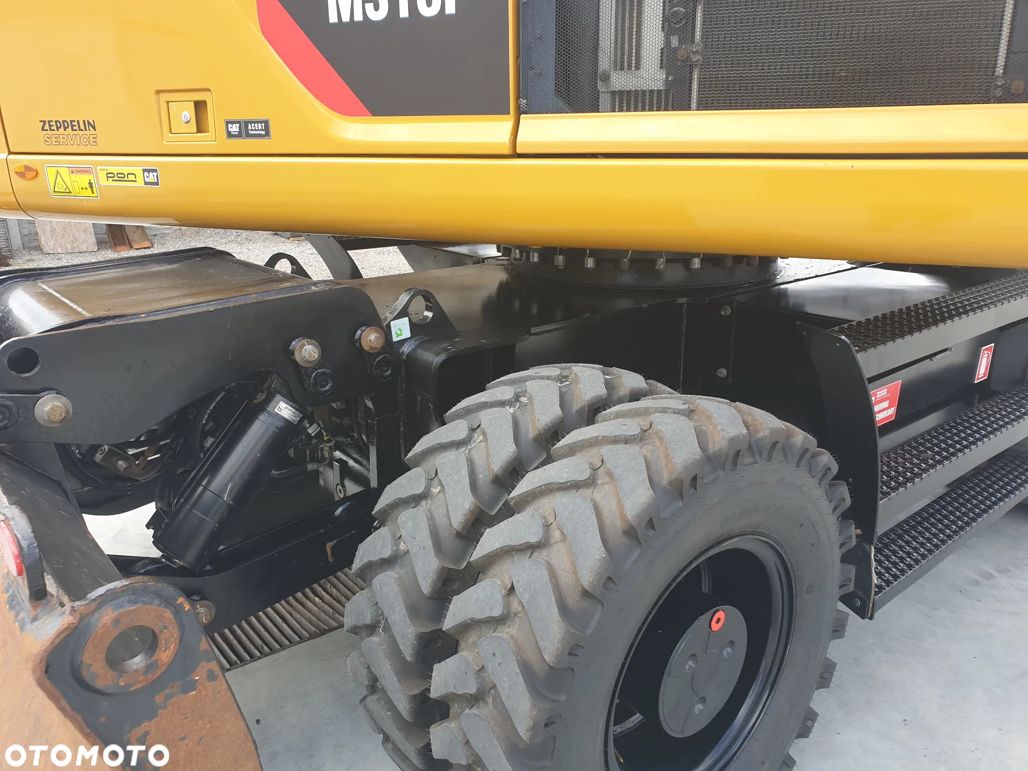 Caterpillar M 318 F ROTOTILT SPROWADZONY ŁADNY STAN - 37