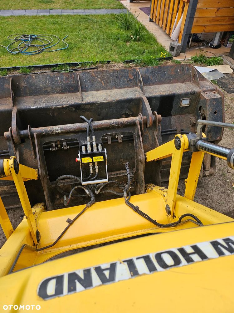 New Holland B115C - 15