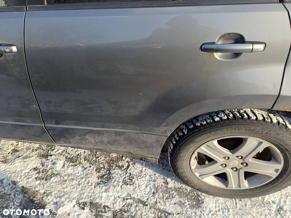 DRZWI KOMPLETNE LEWY TYŁ SUZUKI GRAND VITARA II ZDL - 2