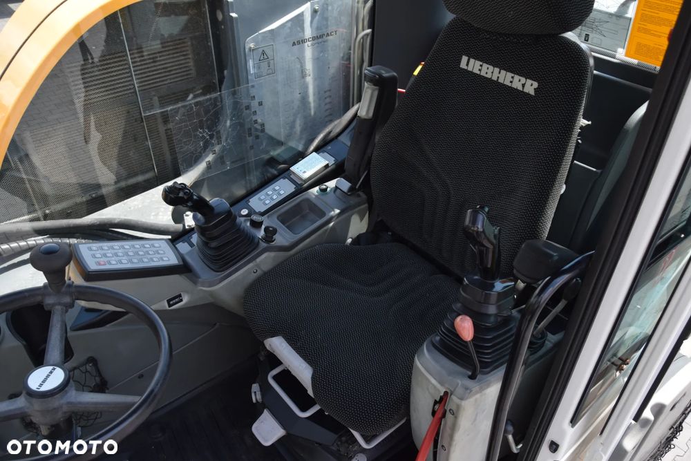 Liebherr A910 COMPACT / KOPARKA KOŁOWA / KABINA / KLIMATYTZACJA / SPYCH / PODPORY / DODATKOWY OSPRZĘT / SPROWADZONA - 27