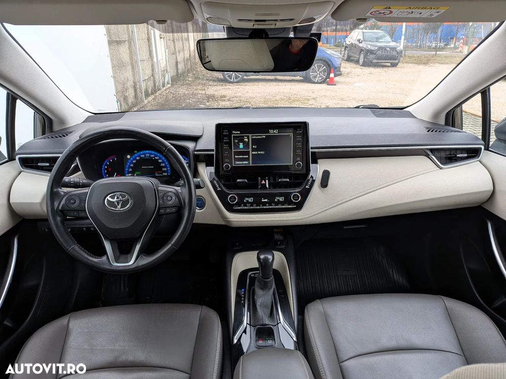 Toyota Corolla 1.8 HSD Exclusive Plus tapiterie Gri - 13