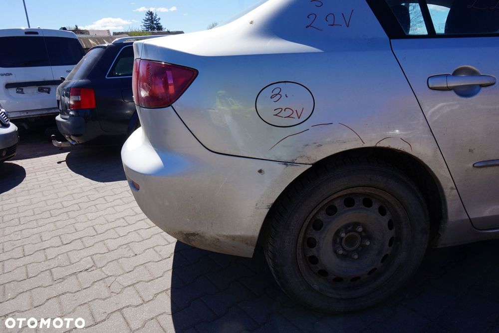 ZDERZAK TYLNY 3 I BK SEDAN 22V  SREBRNY MAZDA 2003-2006 - 3