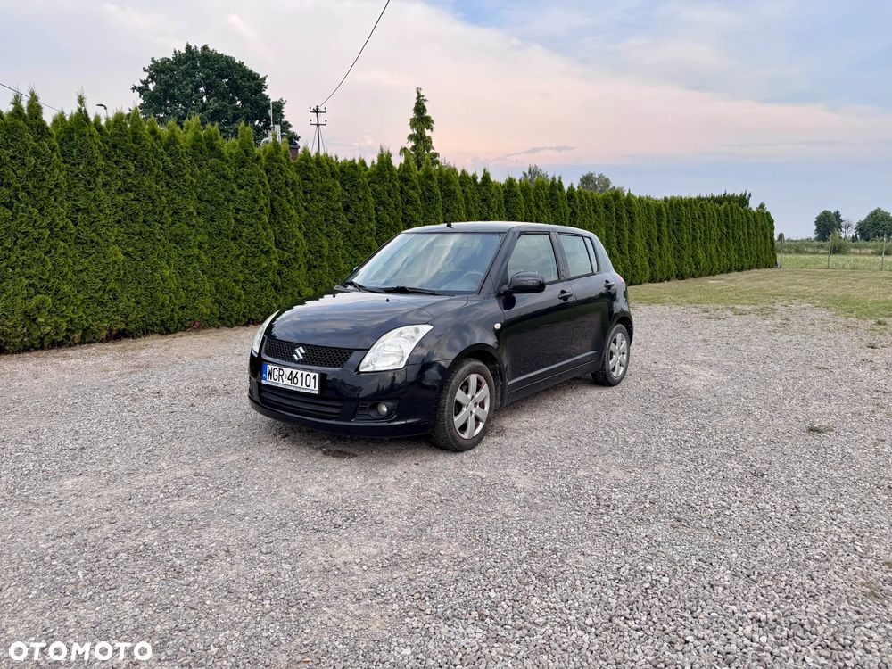 Suzuki Swift 1.3 Club - 4