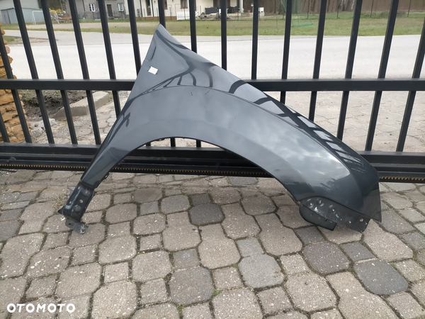 Błotnik prawy dacia duster teb66