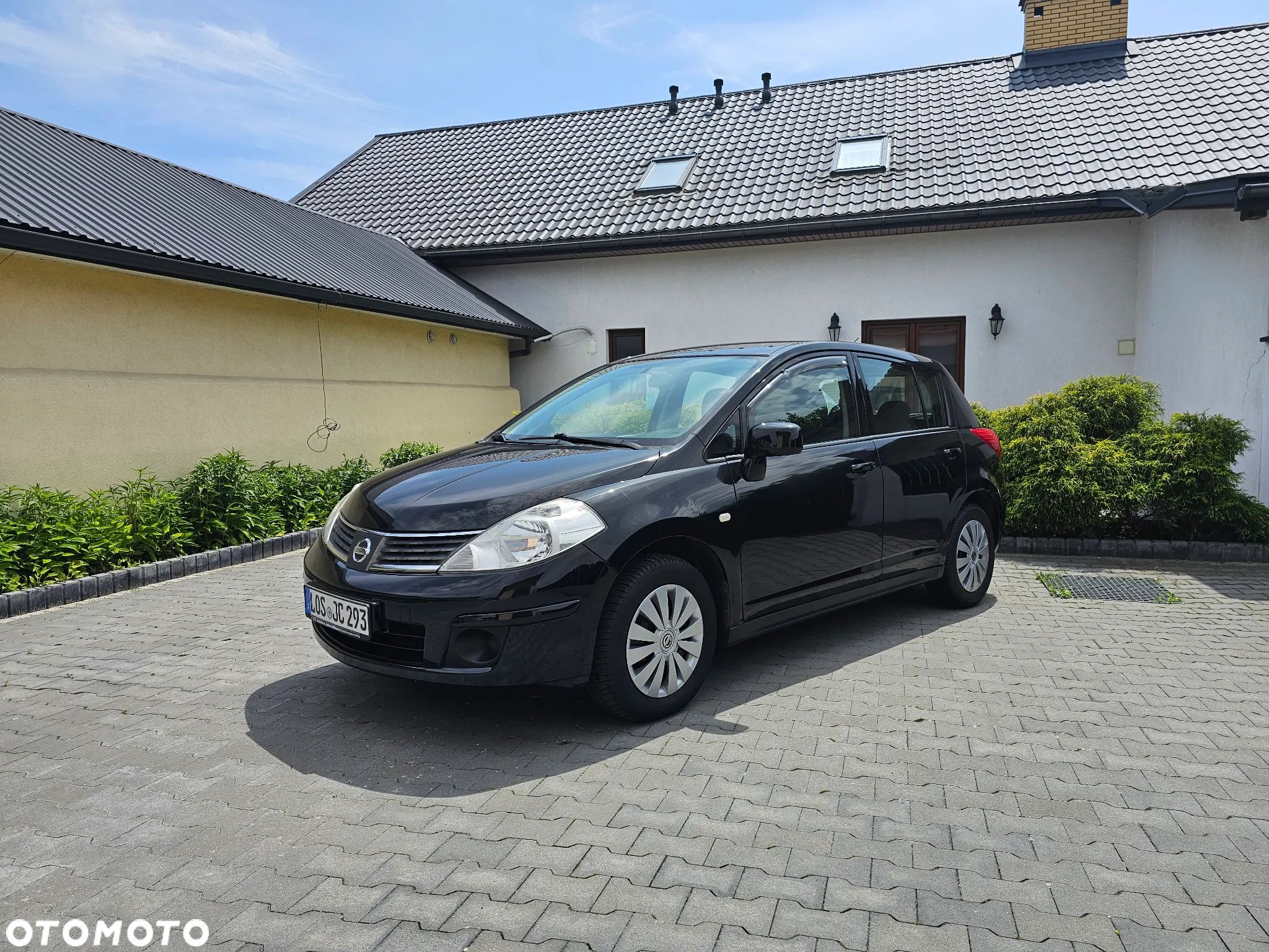 Nissan Tiida 1.6 Tekna - 1