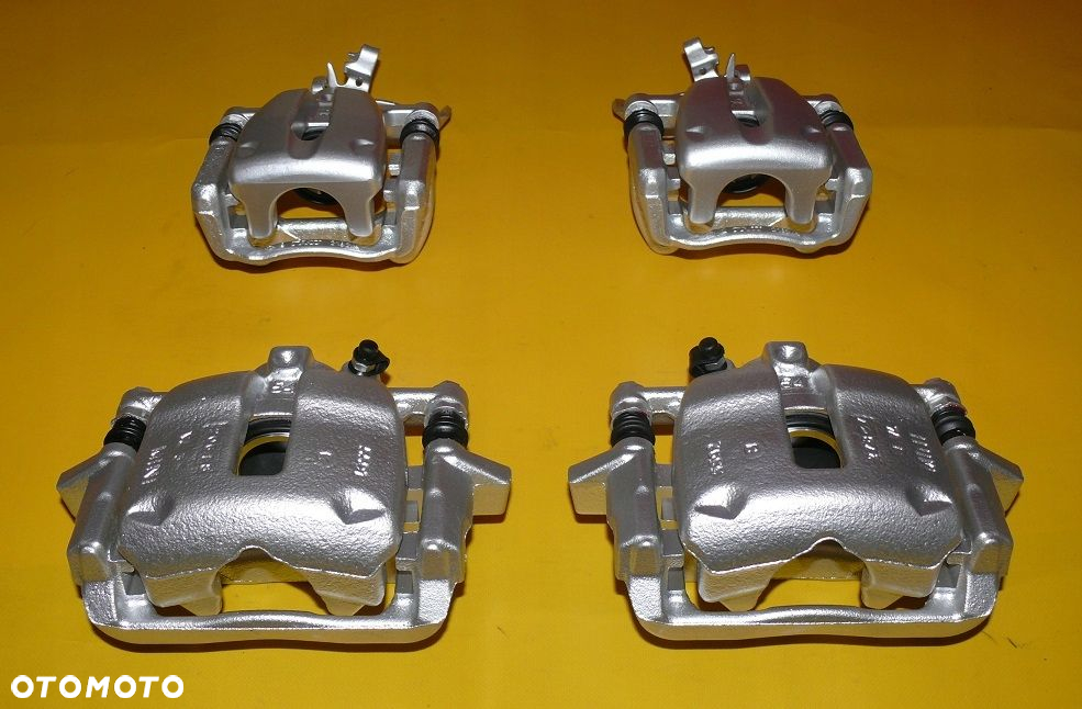 ZACISKI JARZMA LEWY PRAWY PRZÓD TYŁ MINI COOPER R56 294/22 259/10 07-13r. - 2