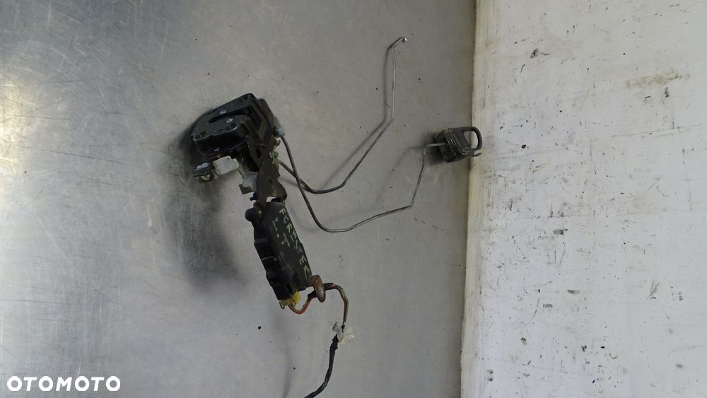 ZAMEK LEWY TYŁ DRZWI SUBARU FORESTER I 2.0 - 2