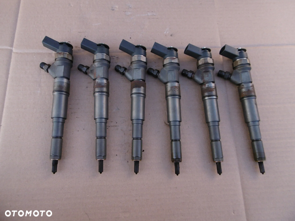 Wtryskiwacz BMW e60 e61 e90 e91 e92 e93 3.0d 3.0 m57n2 197km 306d3 7794435 0445110209
