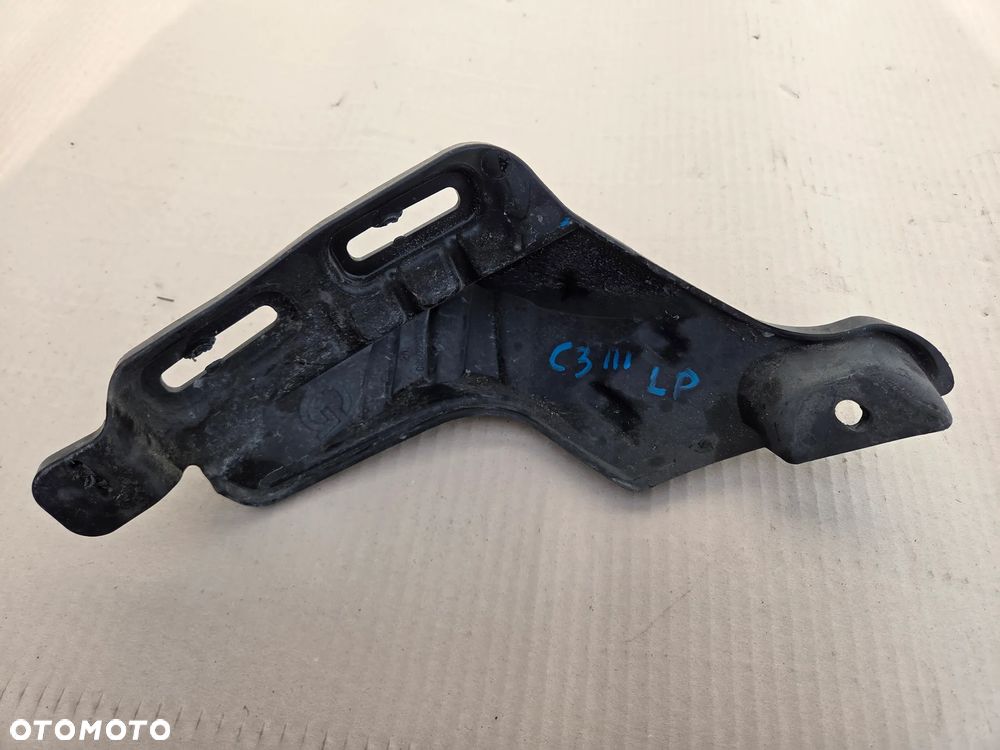 Mocowanie wspornik błotnika lewy przód Citroen C3 III   9812550980 - 1