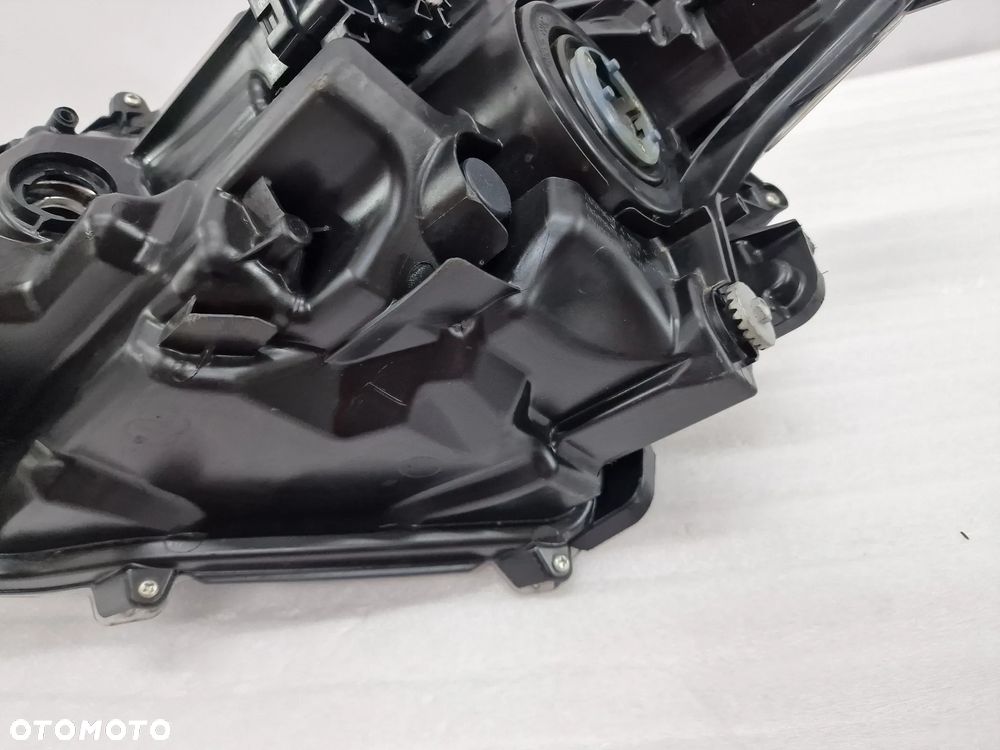 TOYOTA COROLLA E21 18- LEWA / PRAWA ZWYKŁA LAMPA PRZEDNIA PRZÓD SOCZEWKA , NR 81110-02T31-00 / 81150-02T31 / 81150-02T31-00 , NR AUKCJI LA372 - 10