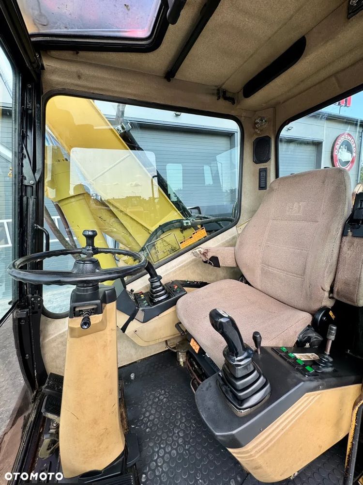 Caterpillar M315 - 8