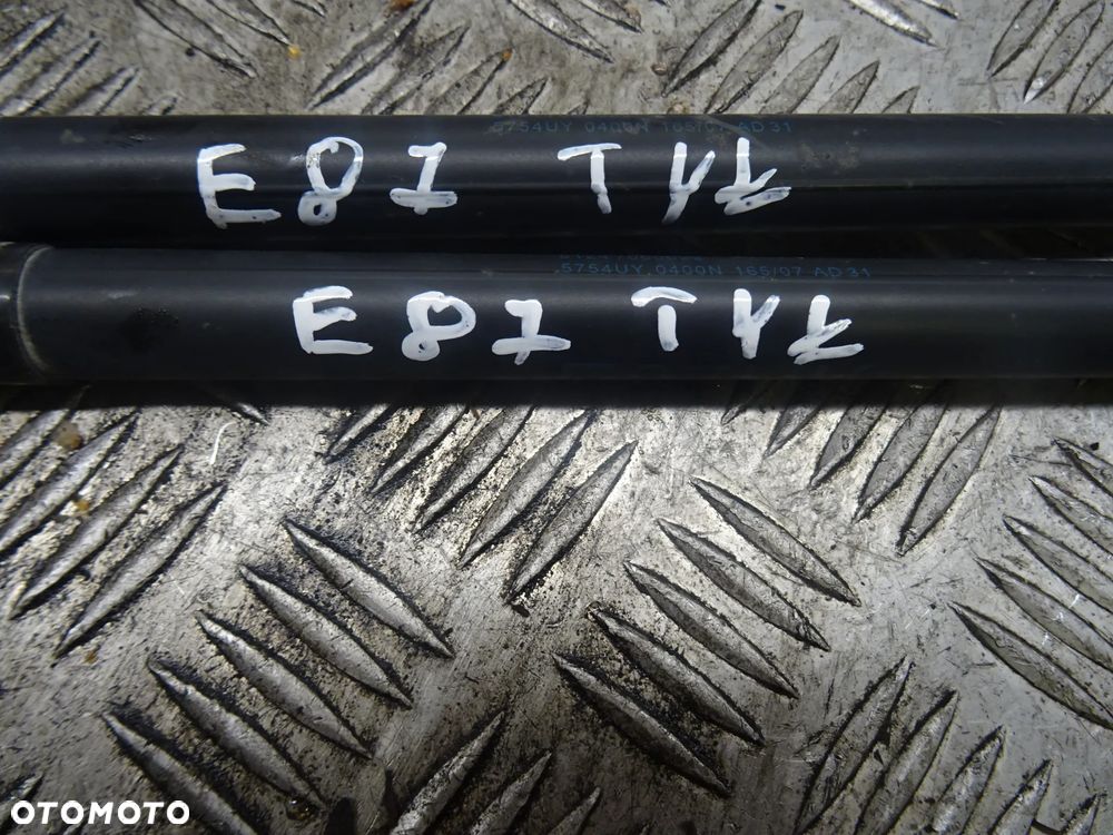BMW E87 04-07 2.0B SIŁOWNIK KLAPY BAGAŻNIKA TYŁ TYLNEJ 51247060622 - 2