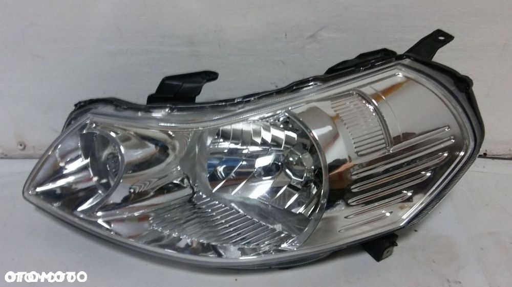Reflektor lewy Lampa lewa Fiat Sedici 2006- - 1