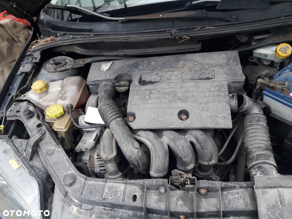 Mazda 2 02-07  DY Silnik  1.2  1.4 16V belka skrzynia półóś  igła 178 tyś  wtryski turbina alternator pompa belka felga - 2
