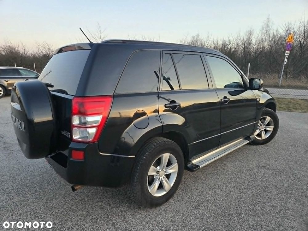 Suzuki Grand Vitara 2.0 - 7