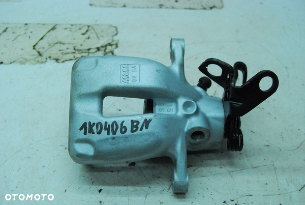 ZACISK HAMULCOWY PRAWY TYŁ REGENEROWANY VW GOLF VI TRW 1K0406BN AUDI SEAT SKODA