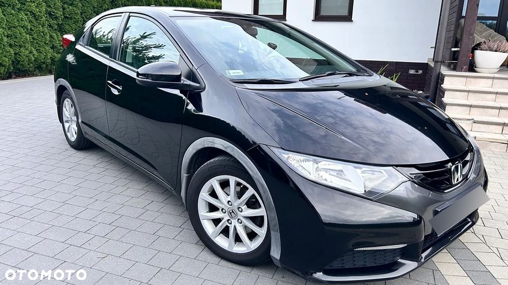 Honda Civic 1.4 Comfort - 1