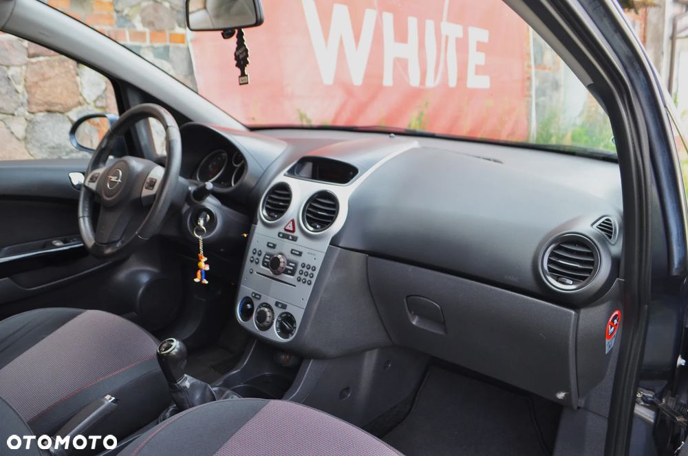 Opel Corsa 1.4 16V Enjoy - 19