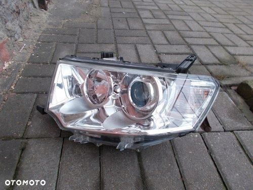 MITSUBISHI PAJERO SPORT L200 SOCZEWKA H7 LEWA PRZEDNIA LAMPA ORYGINAŁ - 2