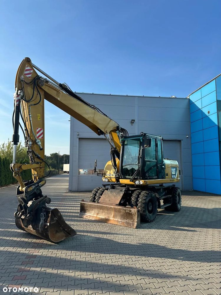 Caterpillar 313D - 4