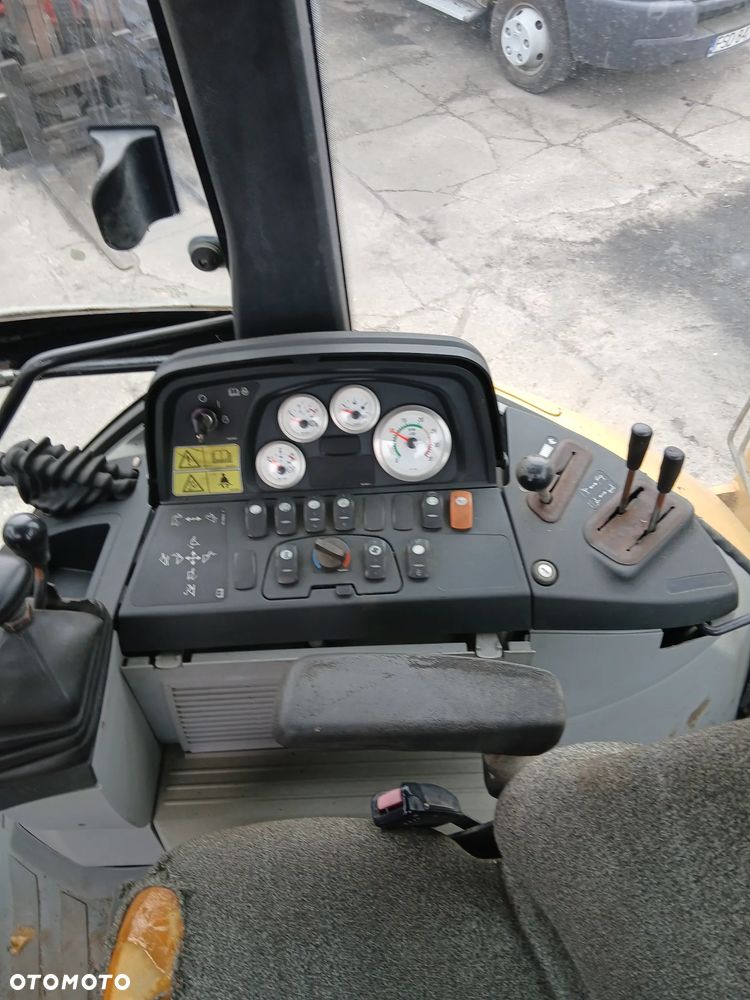 Caterpillar 428 E - 10