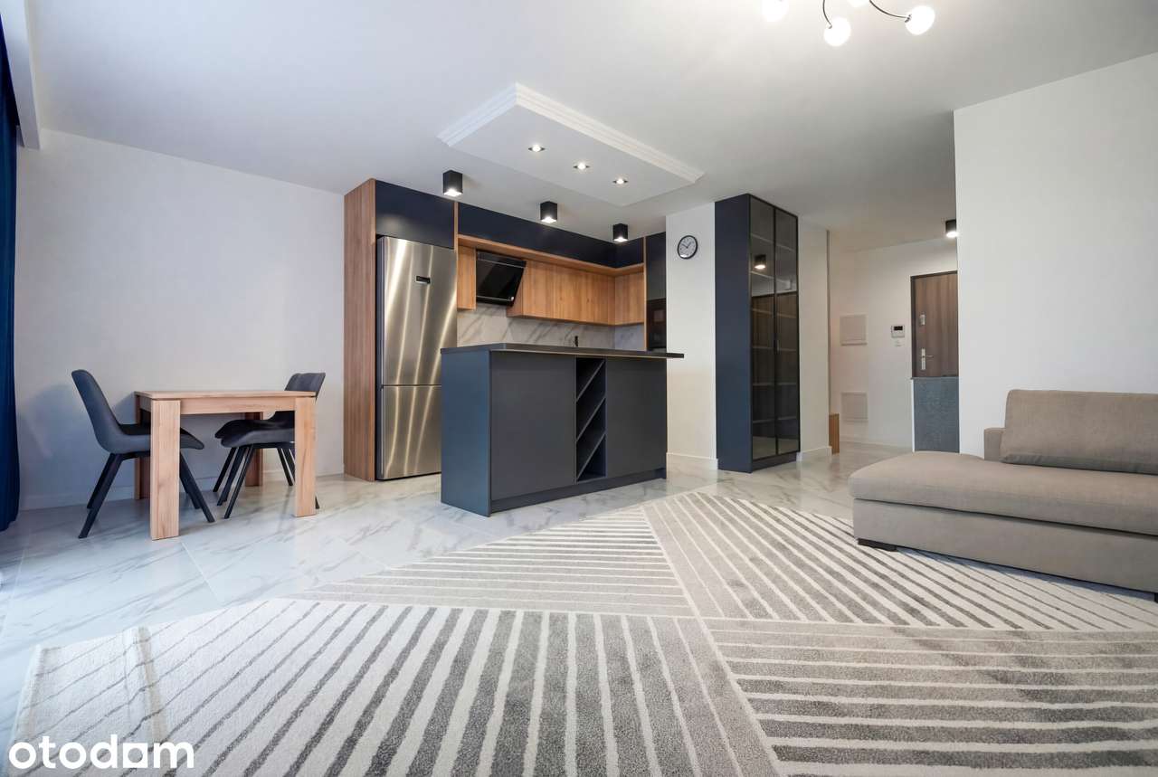 Apartament z 4 miejscami postojowymi – Strażacka
