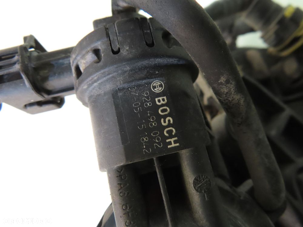 KOLEKTOR SSĄCY OPEL CORSA D 1.2 - Z 12 XEP 0280600063 55557906 - 4