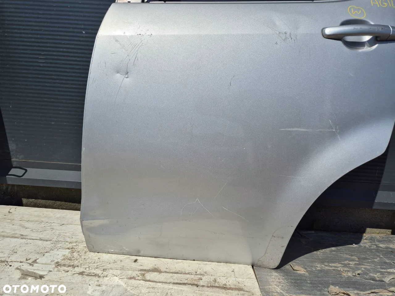 PRZOD LEWY ZAMEK 299 ZŁ DRZWI LEWY TYŁ PRZÓD PRAWY TYŁ CZĘŚCI WYPOSAŻENIA DRZWI OPEL AGILA B - 30