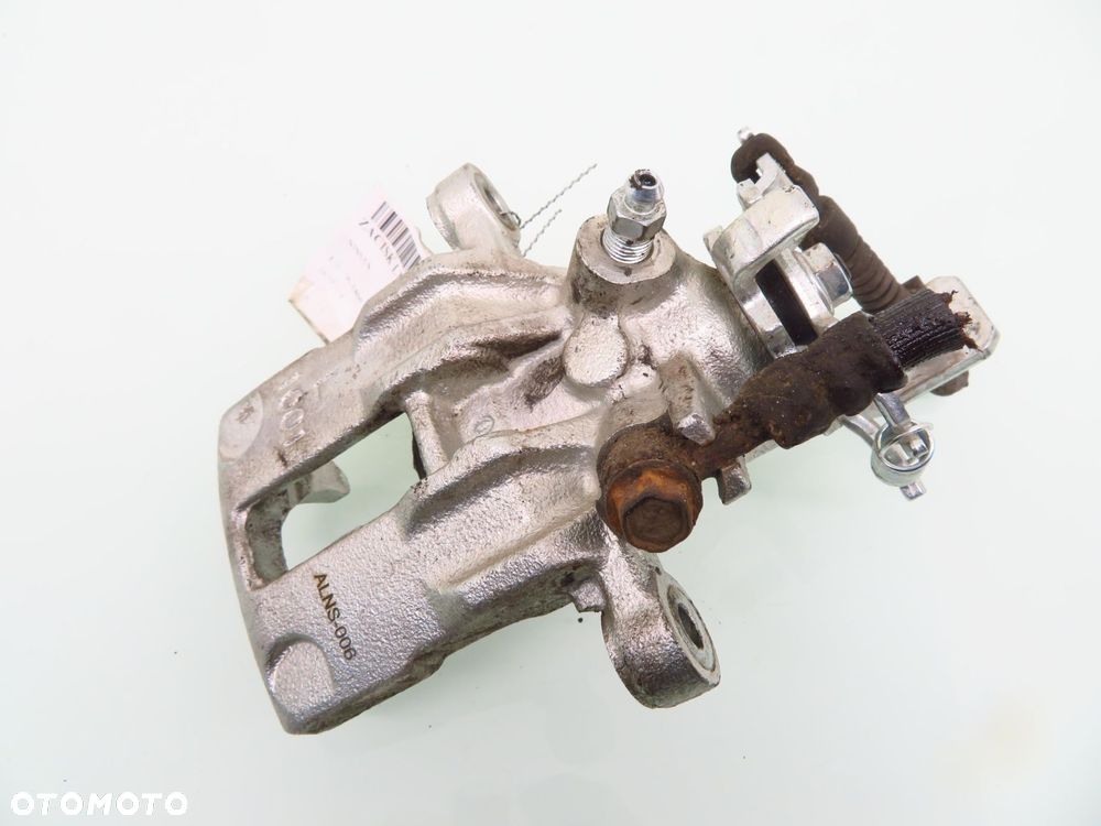ZACISK LEWY TYŁ NISSAN ALMERA II N16 1.8 QG18DE - 4
