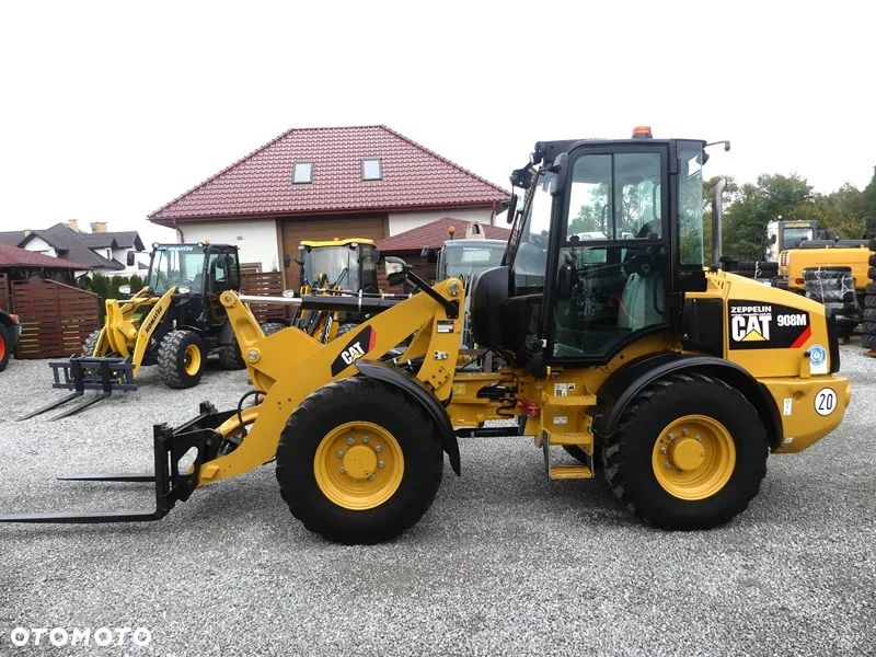 Używany Caterpillar CAT 908M Z Niemiec / 2.238 mtg Serwisowany ...