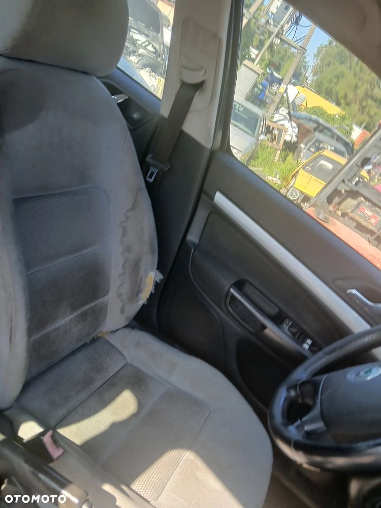 Skoda Octavia II HB 1Z1Z  maska pokrywa silnika klapa bagażnika zderzak lampa reflektor pas przedni stop lampy halogeny przeciwmgłowe odblaski grill atrapa - 8