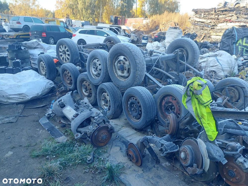 BELKA OŚ ZAWIESZENIA TYŁ BĘBNY BEZ ABS CHEVROLET AVEO I 03-07 HB 5D - 5