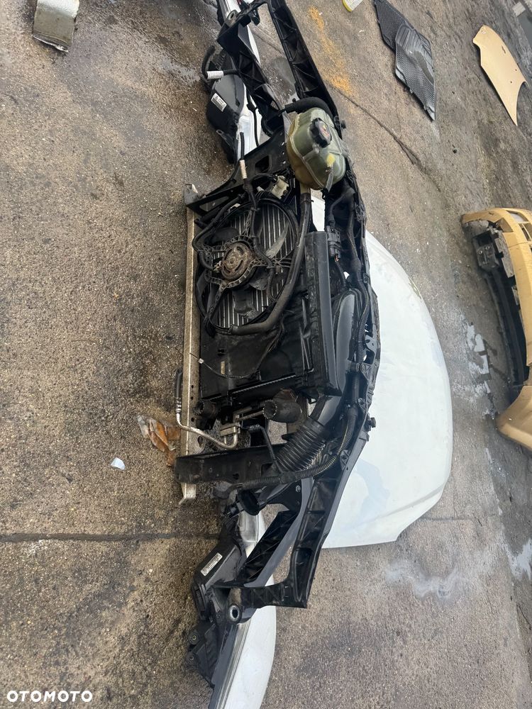 Opel Corsa D biała maska drzwi prawe lewe przednie przód pas przedni chłodnice wody klimy lampy lampa przednia prawa lewa błotnik prawy lewy biały białe zderzak przód przedni klapa bagażnika klapa tył tylnia lampa prawa lewa belka pod zderzak - 5