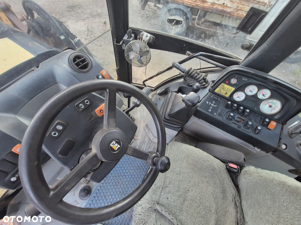Caterpillar 428 E - 8