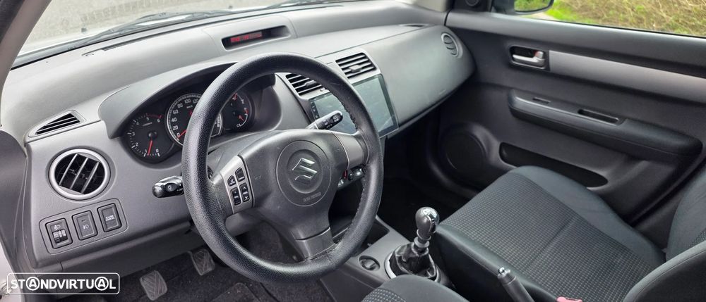 Suzuki Swift 1.3 DDiS GLX - 9
