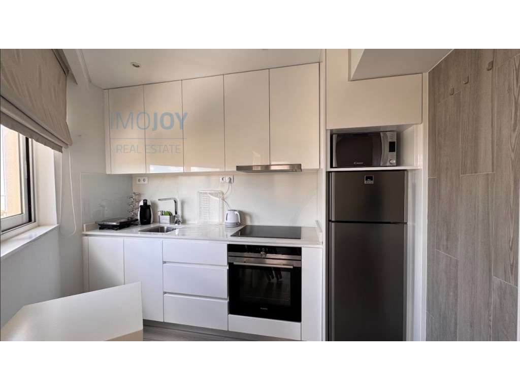 Apartamento T2 na Praia da Rocha em Portimão - Grande imagem: 4/21