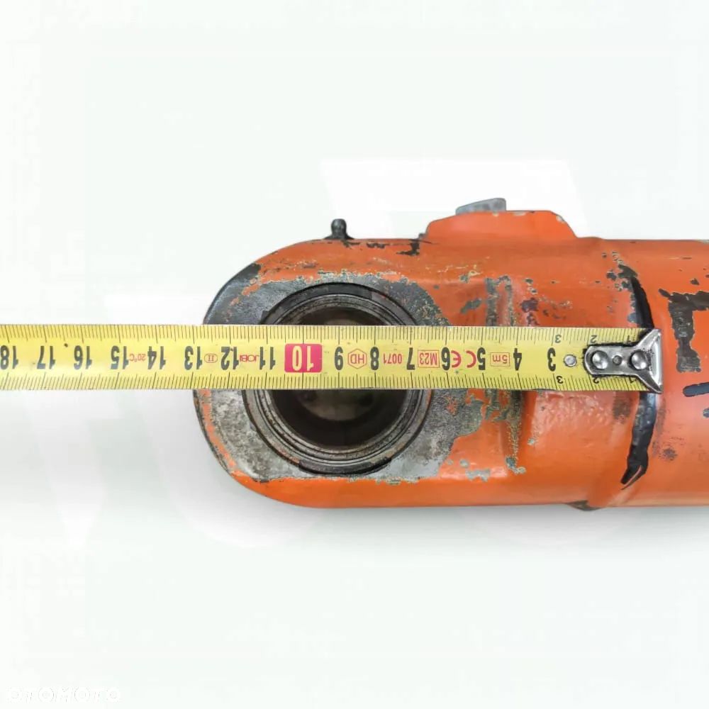 Siłownik poziomowania łyżki 85800911 New Holland LB 115 - 4