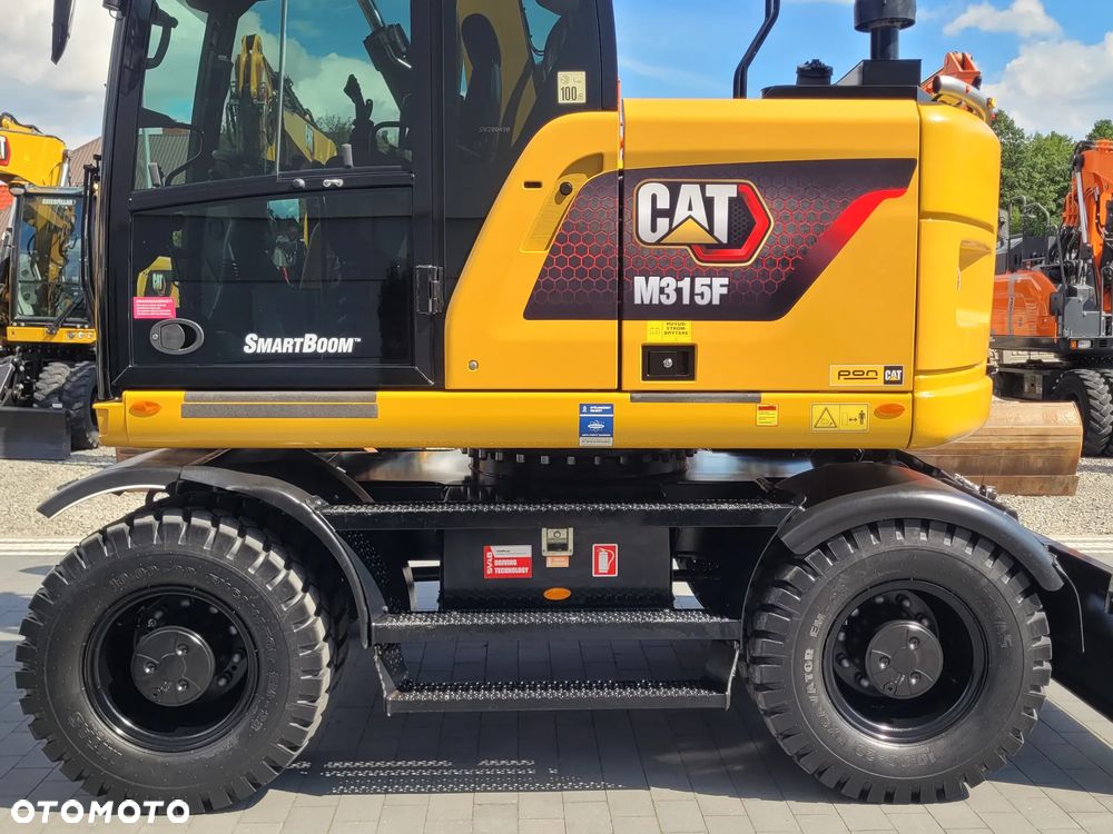 Caterpillar M315F / ROTOTILT ze szczypcami / 3700h / jak NOWA / - 12