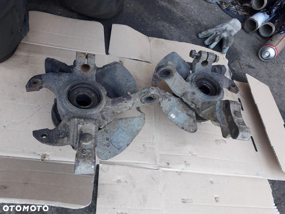 Mazda 323f 323 323p BA 94-98  Zwrotnica piasta Prawa lewa przednia prz - 4