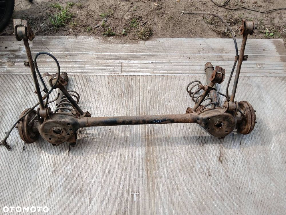 BELKA OŚ ZAWIESZENIA TYŁ BĘBNY BEZ ABS NISSAN MICRA K11 - 6