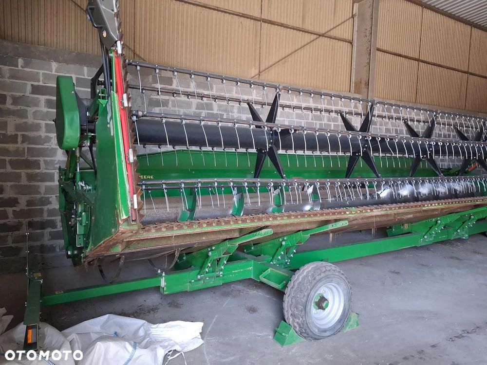 John Deere T670 - 11