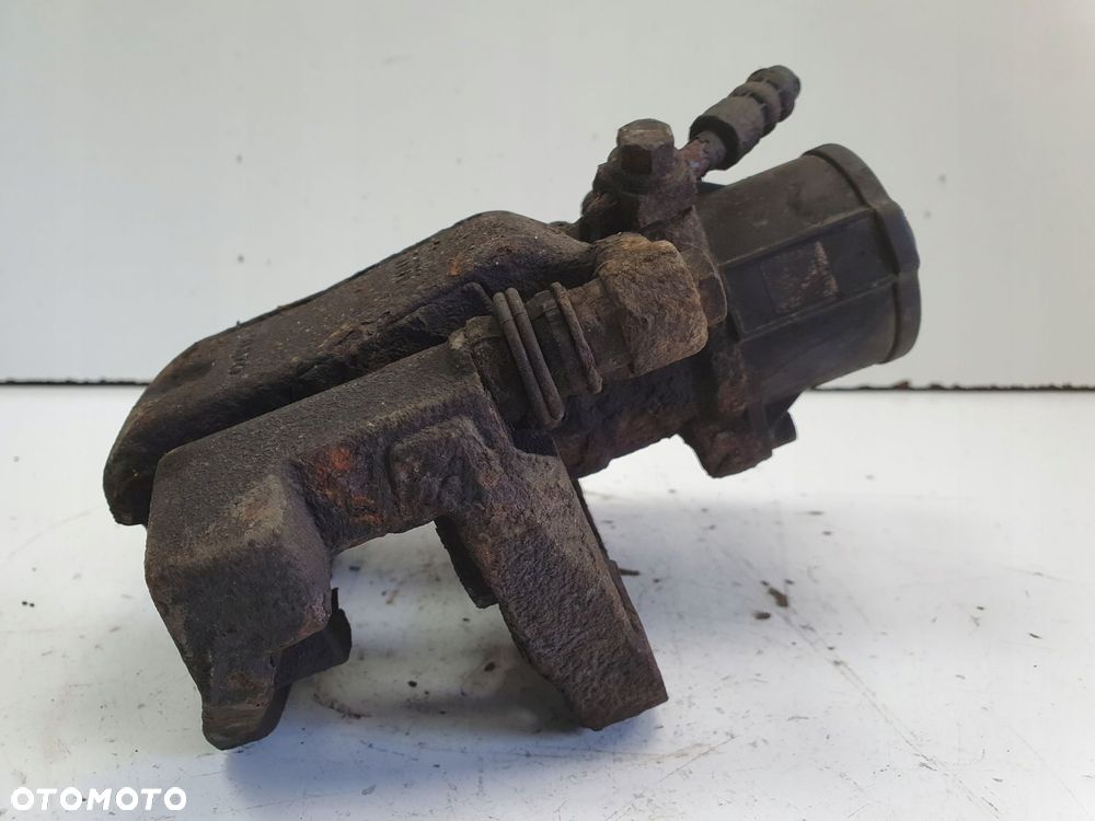 Volvo S60 II S80 II V60 V70 III XC70 II TYLNY ZACISK HAMULCOWY lewy tył - 3