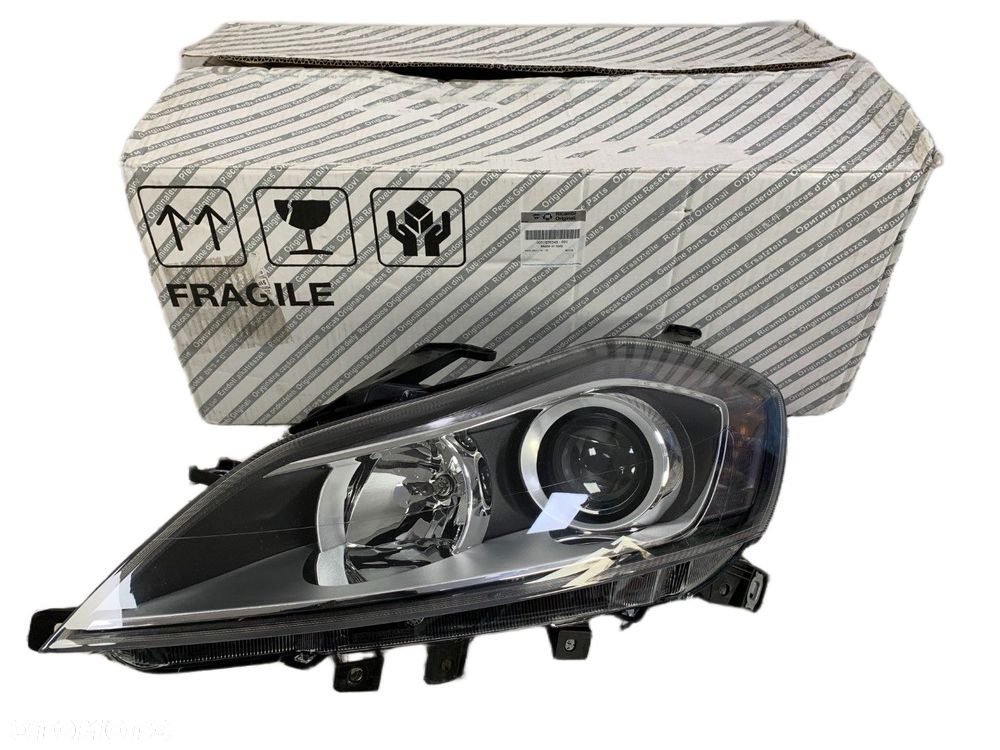 NOWA ORYGINALNA LAMPA LAMPA LEWA PRZEDNIA LEWY PRZÓD LANCIA DELTA 08-14 51876348 - 1