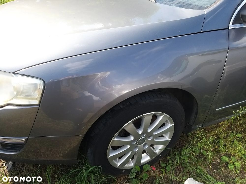 Volkswagen Passat B6 2,0 tdi lewy błotnik kolor lakieru LA7T